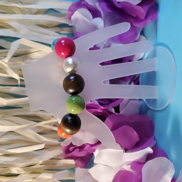 Multicolored  large to small beaded bracelet. Will match anything in your closet - Picture 2 of 2